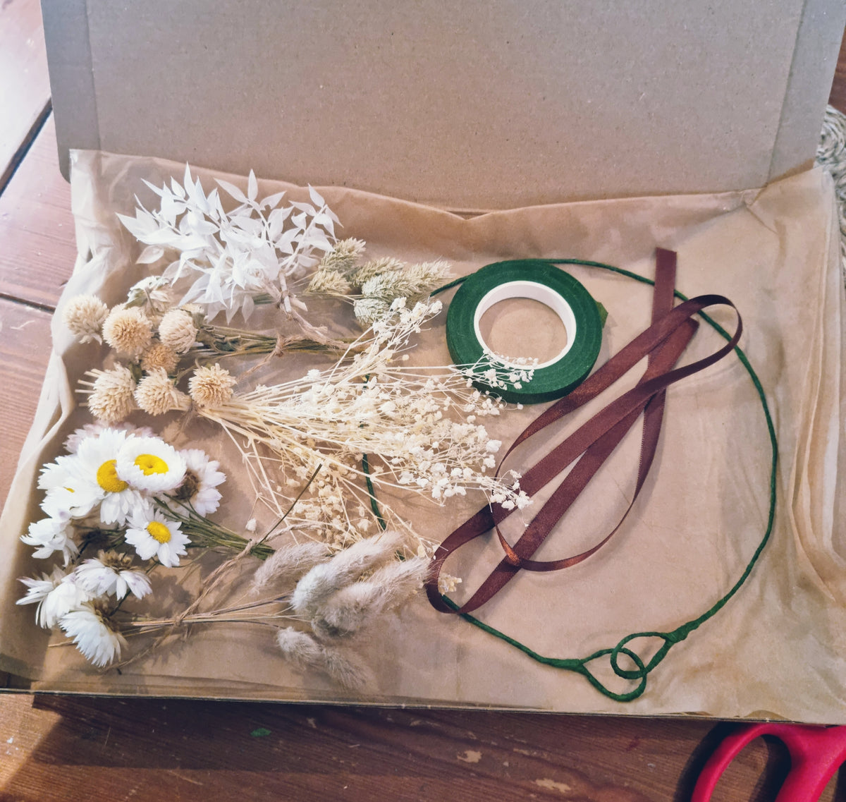 A box of dried flowers for the DIY crown kit